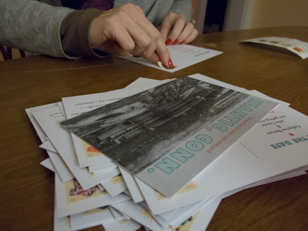Stamping the final postcards.